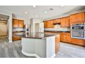 Spacious kitchen with an island, stainless steel appliances, and granite countertops at 9271 Martel Ave, Las Vegas, NV 89148