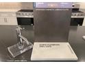 Upgrade sample featuring Lubbock Slate cabinets, Simply White quartz countertops, and a Moen Gibson faucet at 11881 Pied Harrier Ave, Las Vegas, NV 89138