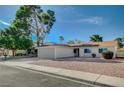 Charming single-story home with mature tree, wide driveway, and desert landscaping at 4496 Skyview Dr, Las Vegas, NV 89104