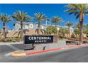 Centennial Heights community sign surrounded by mature palm trees and professionally landscaped grounds at 10773 Bede Ct, Las Vegas, NV 89166