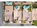Aerial view of the property showcasing a sparkling pool and well-maintained landscaping at 11157 Sandy Grove Ave, Las Vegas, NV 89144
