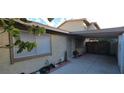 This side yard features a covered patio and room for outdoor enjoyment at 2216 Short Pine Dr, Las Vegas, NV 89108