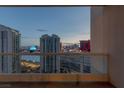 Fantastic city view from the balcony, featuring modern high-rise buildings and casinos at night at 2777 Paradise Rd # 2302, Las Vegas, NV 89109