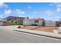 Cozy single-level home featuring a convenient covered parking space and xeriscaped front yard at 460 Crestway Rd, Henderson, NV 89015