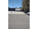 Cozy single story home with gated driveway and desert landscaping at 4727 Conrad St, Las Vegas, NV 89121