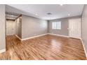 Inviting living room with neutral tones, LVP flooring, and recessed lighting at 5257 Sunbury Ave, Las Vegas, NV 89122