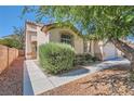 Charming single-story home with desert landscaping, close up view at 7515 Splashing Rock Dr, Las Vegas, NV 89131