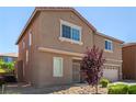 Charming two-story home featuring an attached two-car garage at 9173 Weeping Hollow Ave, Las Vegas, NV 89178