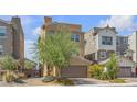 Desirable two-story house with private two-car garage and convenient driveway at 156 Campbelltown Ave, Henderson, NV 89015