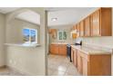 Efficient kitchen with ample cabinet space, ready for cooking at 2257 Colebrook St, Las Vegas, NV 89115