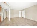 Spacious living room features neutral walls and tiled floor at 2257 Colebrook St, Las Vegas, NV 89115