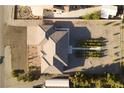 Aerial view of a single Gathering home showing landscaping and roofline at 2261 Pampa Ave, Pahrump, NV 89048