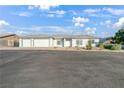 Charming single-story home with a well-maintained circular driveway at 2261 Pampa Ave, Pahrump, NV 89048