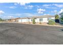 Well-kept single-story home with a spacious circular driveway at 2261 Pampa Ave, Pahrump, NV 89048