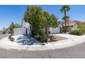 Charming single-Gathering home featuring a two-car garage and low-maintenance desert landscaping at 3336 Hidden Ridge St, Las Vegas, NV 89129