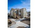A stucco two-story condo building with stairs up to the second floor and desert landscaping at 4655 Gold Dust Ave # 206, Las Vegas, NV 89120