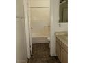 Simple bathroom featuring a shower-tub combo, toilet, and vanity with a mirror, designed for functionality at 5024 Saint Annes Dr, Las Vegas, NV 89149