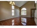 Bright living room showcasing high ceilings and gleaming tile floors at 5115 Blossom Ave, Las Vegas, NV 89142