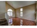 Open-concept living room featuring high ceilings and tile floors at 5115 Blossom Ave, Las Vegas, NV 89142