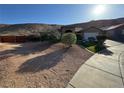 Desert front yard with low-water landscaping and desert plantings at 574 Desert Tortoise Way, Mesquite, NV 89027
