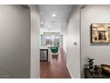 Hallway view toward living space featuring stainless appliances and window view at 8255 Las Vegas Blvd # 1219, Las Vegas, NV 89123