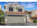 Attractive two-story home featuring a tile roof, neutral stucco, and a spacious garage at 8316 Maplestar Rd, Las Vegas, NV 89128