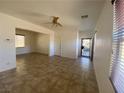 Open living room featuring tile flooring, recessed lighting, and natural light at 8566 Bright Bush St, Las Vegas, NV 89131