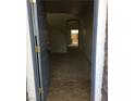 View from the front door of a neutral color scheme, archway, and carpeted living area at 8749 Brilliant Star Dr, Las Vegas, NV 89178