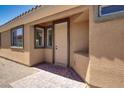 Welcoming front entrance with a stylish front door and stone-paved entryway at , North Las Vegas, NV 89084