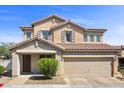 Inviting two-story home boasts a tile roof, complemented by a well-manicured front yard at 10468 Concetta Ave, Las Vegas, NV 89129