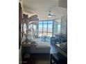Bright living room featuring an oversized sectional couch and floor-to-ceiling windows with scenic views at 200 W Sahara Ave # 3510, Las Vegas, NV 89102