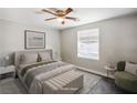 Cozy bedroom featuring a plush bed, stylish furniture, and plenty of natural light at 280 Gentry St, Overton, NV 89040