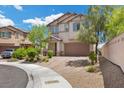 Charming two story home with a brick driveway and well maintained landscaping at 4030 Midnight Crest Ave, North Las Vegas, NV 89031