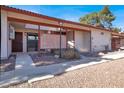 Single-story home with gated courtyard and desert landscaping at 417 N Lamb Blvd # E, Las Vegas, NV 89110
