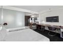 Bright bedroom features a kitchenette, workspace, and modern finishes at 4381 W Flamingo Rd # 3809, Las Vegas, NV 89103