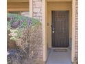 Inviting entryway features a secure iron gate and a charming, welcoming aesthetic at 5507 Gemini Bridges St, Las Vegas, NV 89130