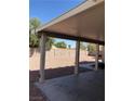 Covered patio with concrete and xeriscaping at 6196 W University Ave, Las Vegas, NV 89103