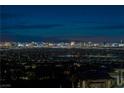 Panoramic city view at night showcasing the bright lights of the city skyline at 641 Majestic Rim Dr, Henderson, NV 89012