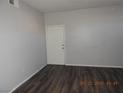 Bright living room with wood flooring and a neutral color scheme, ideal for any decor at 75 N Valle Verde Dr # 411, Henderson, NV 89074