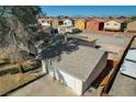 A view of the back of the house with a large dirt lot next to the structure at 1847 Stevens St, Las Vegas, NV 89115
