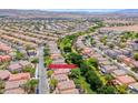 Bird's eye view showcases home's location on 4044 Villeroy Avenue with park and green spaces at 4044 Villeroy Ave, Las Vegas, NV 89141