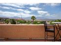 Outdoor balcony with bar height table, chair, and views at 414 Crystal Canyon Dr, Mesquite, NV 89027