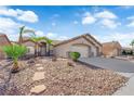 Single-story home with low-maintenance desert landscaping, attached garage, and a pathway to the entrance at 5437 Escallonia St, Las Vegas, NV 89149