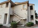 Exterior view of the condominium building with a stairway to the second level at 855 N Stephanie St # 2311, Henderson, NV 89014