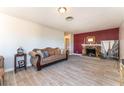 Inviting living room featuring a cozy fireplace and stylish neutral-toned furniture at 908 N 24Th St, Las Vegas, NV 89101