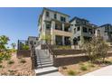 Exterior view of a modern home, showcasing landscaping, and community design at 11552 Ashy Storm Ave, Las Vegas, NV 89138