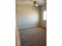 Bedroom with neutral carpet and a ceiling fan at 11625 Cabo Del Verde Ave, Las Vegas, NV 89138