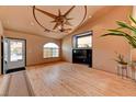 Bright living room with natural light, hardwood floors, and architectural ceiling details at 1523 Silver Point Ave, Las Vegas, NV 89123