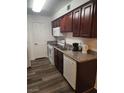 Functional kitchen featuring laminate countertops and standard appliances at 2606 S Durango Dr # 214, Las Vegas, NV 89117