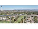 A wide balcony view overlooking a golf course and the Las Vegas cityscape skyline at 3111 Bel Air Dr # 22B, Las Vegas, NV 89109